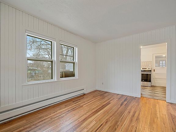 Bright living room with newly finished wood floors