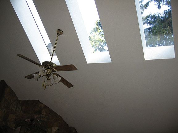 Many skylights brighten the home.