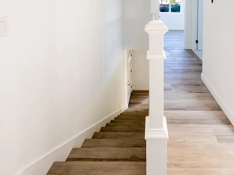 Beautiful staircase leading to your three bedrooms