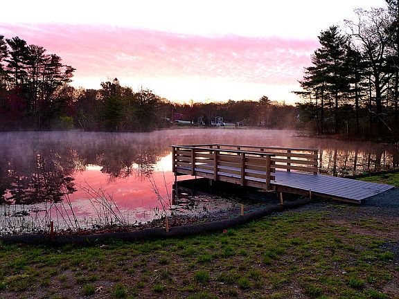 Pond next to house.