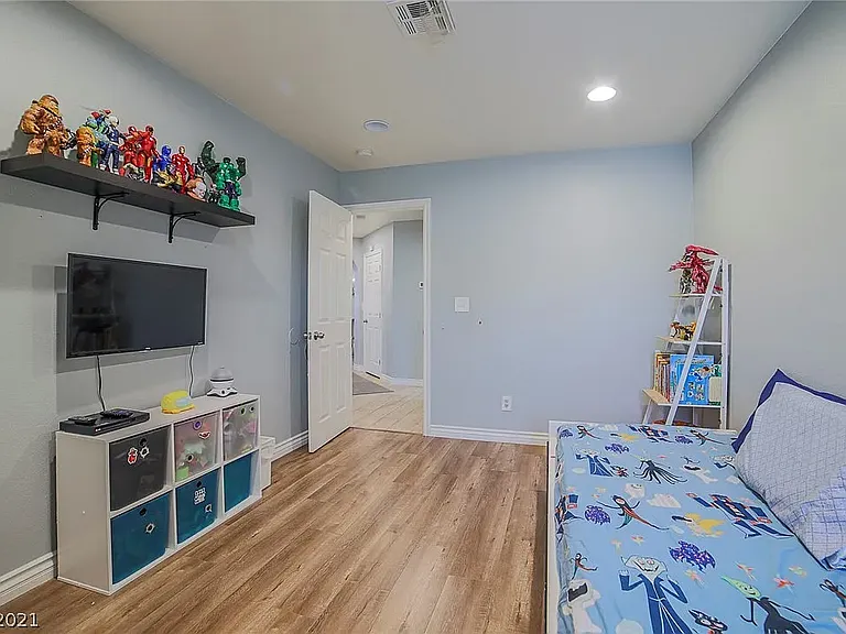 Bedroom #2, hallway closet in background.