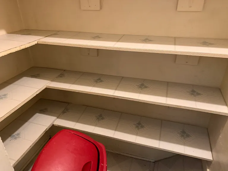 Large pantry off kitchen with tons of storage.