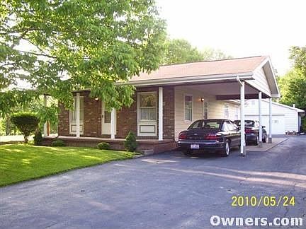 Small Porch in Front Attached 2 Car Port
