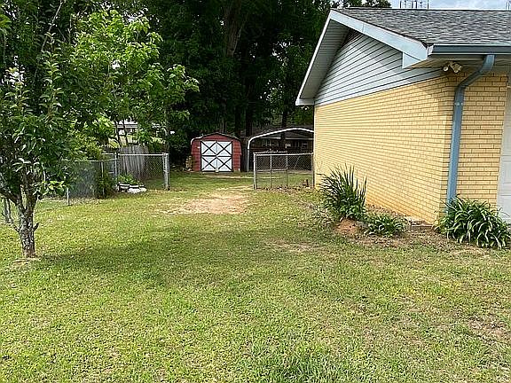 Side yard with pear tree
