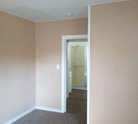 Bedroom facing door to hallway