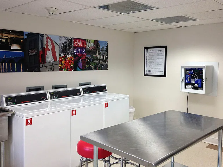 Laundry room with seating area