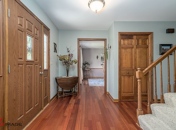 Brazillian Cherry Hardwood floors flow through the main floor.