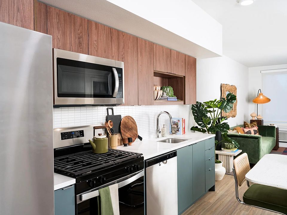 Our gourmet kitchens feature stunning quartz countertops, custom cabinetry, and under-cabinet lighting, creating the perfect backdrop for culinary creations and entertaining.