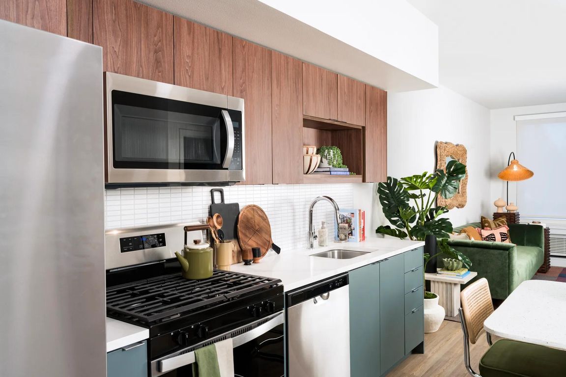 Our gourmet kitchens feature stunning quartz countertops, custom cabinetry, and under-cabinet lighting, creating the perfect backdrop for culinary creations and entertaining.