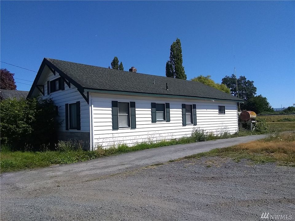 This house has great bones and plenty of parking - even an RV Pad! View from the NW corner.
