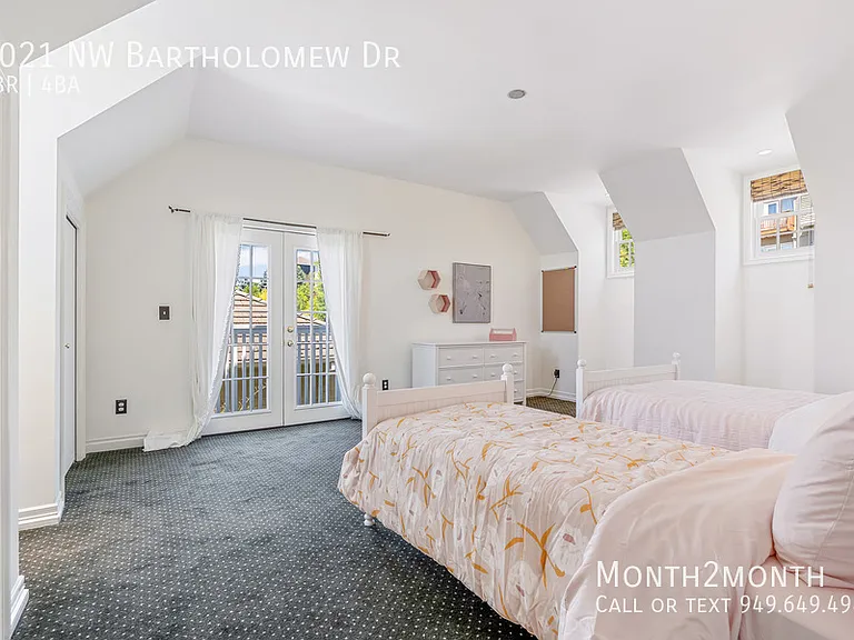 9021 NW Bartholomew Dr — Photo 11