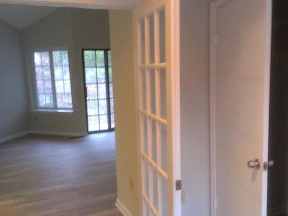 from bedroom 2 out into living room and small outside patio