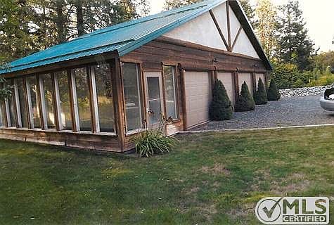 4 Bay garage and greenhouse