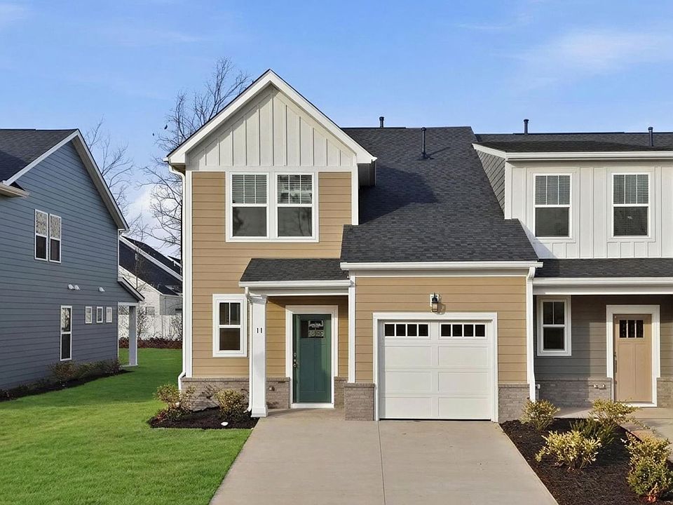 Exclusive DRB Homes Lawson exterior with balanced proportions and vibrant curb appeal at Pelham Cros