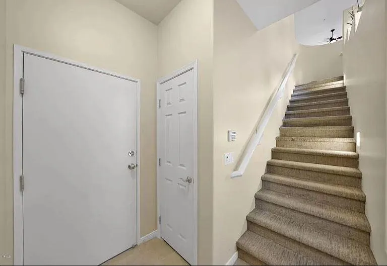 Stairs from Garage to Living area. All bedrooms, kitchen, dining and living on one level.