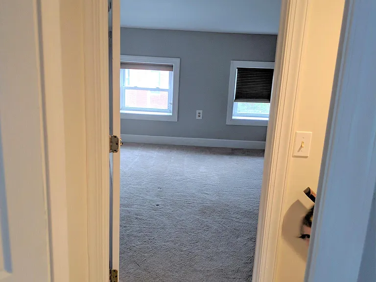 3rd floor hall looking at the front 3rd floor bed