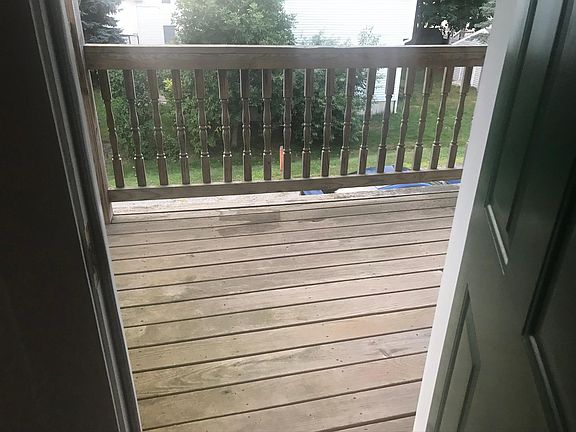 Second Floor Primary Entrance and Balcony (From Interior)