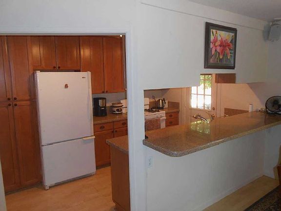 Kitchen With Counter Top Bar