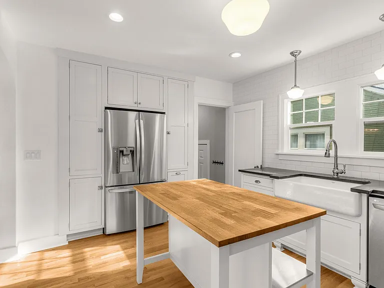 8036 N Syracuse St — Photo 30