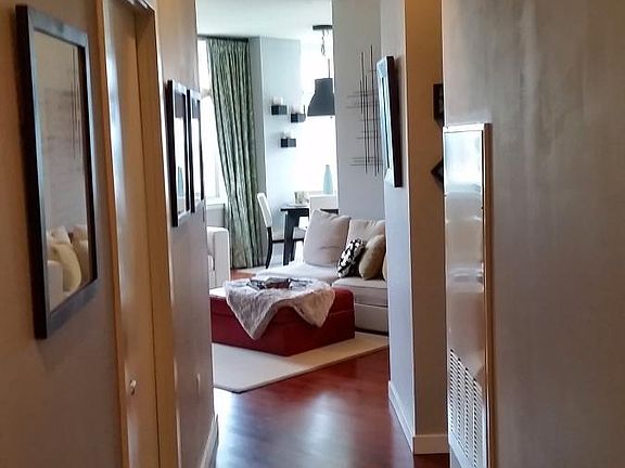 Hallway from front door to living space makes for a quiet and private layout
