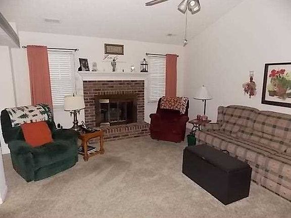 Great Room. View of attractive brick fireplace and hearth in great room.