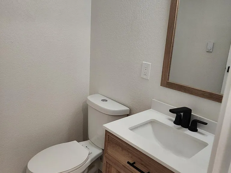 Powder room on main floor (same as kitchen)