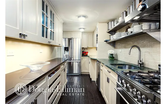 Sold by Douglas Elliman | media 13