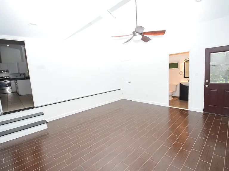 Flex Room showing entrance from main living area, full bath, and exterior door.