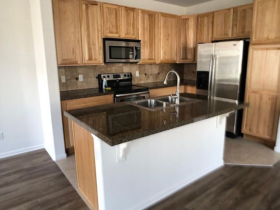 Kitchen with stainless and granite
