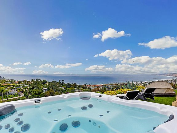 Hot tub overlooking view, with adjacent outdoor shower
