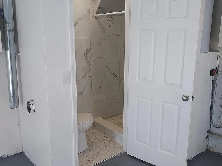 Newly remodeled garage bathroom.