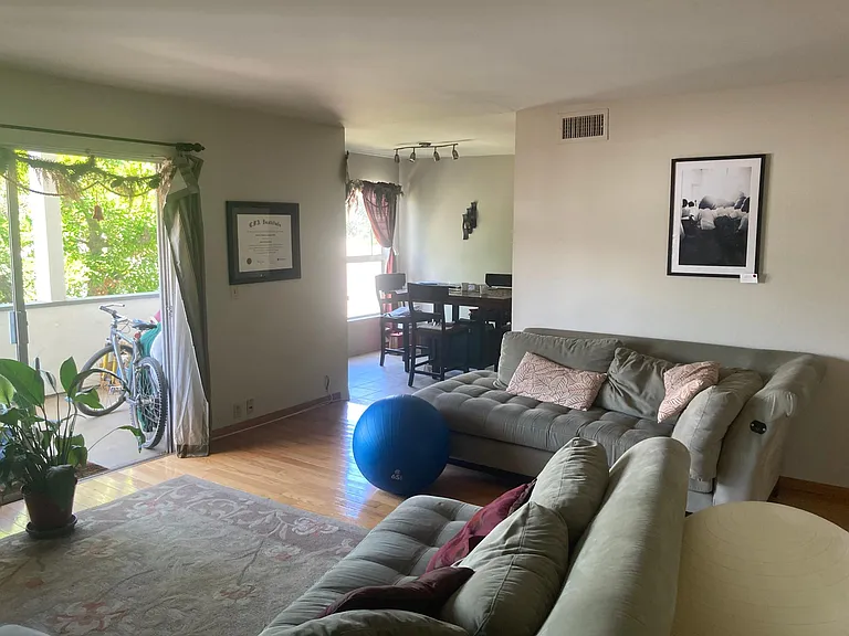 Living room, dining area & balcony