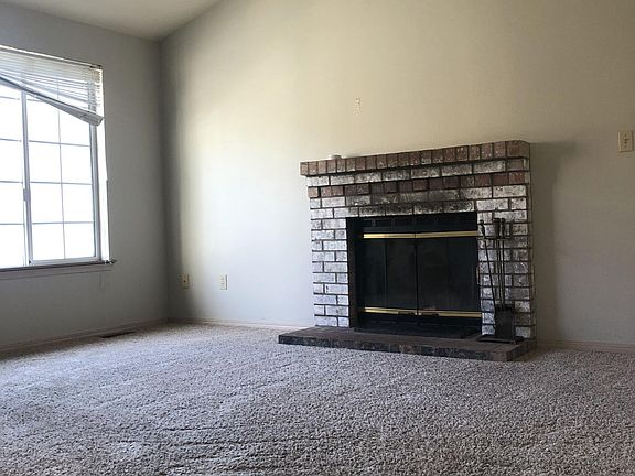 Living room with vaulted ceiling