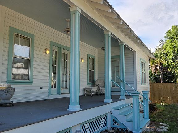 side porch with entrance to great room and 2nd bedroom