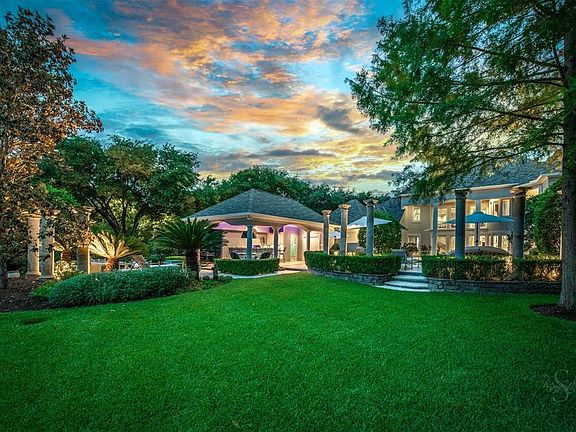 Elegant stately architecture inside and out. This home has impeccably manicured professional landscaping on a lot that is over 34,000 square feet.