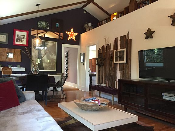 Livingroom with vaulted ceilings and loft