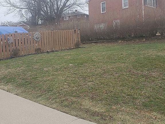 Fenced in yard and carport 