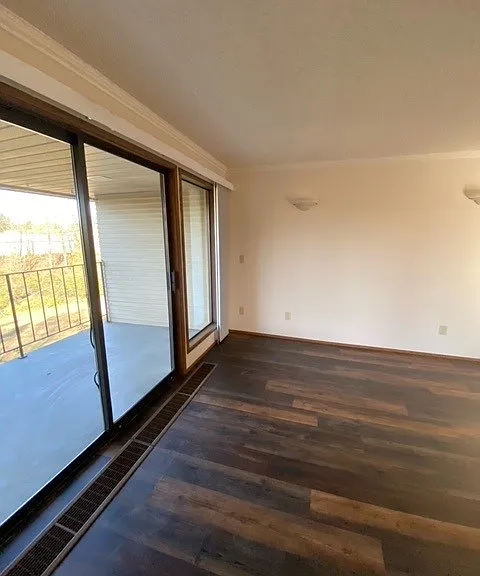 Patio outside of living room - Views of gazebo/garden area.