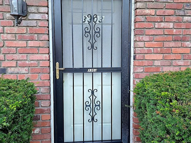 Heavy storm door on individual front entrance