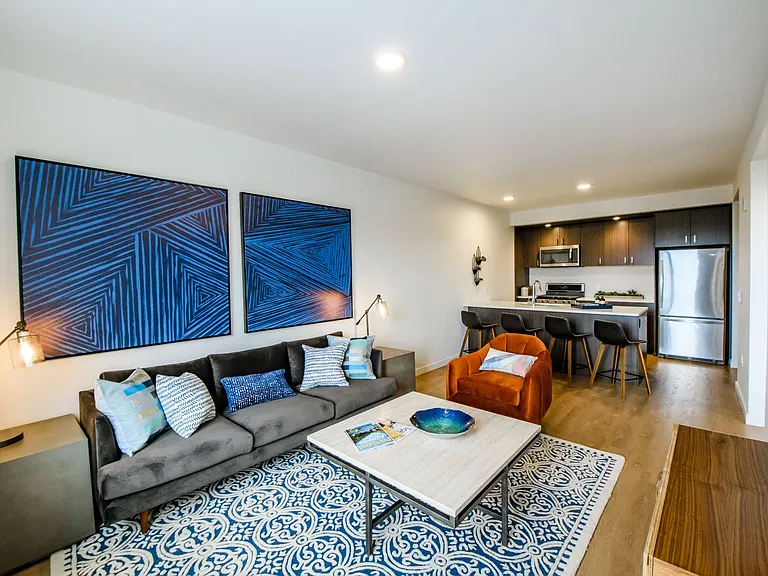 Wood style plank flooring, stainless steel appliances, and gas cooktops, oh my!