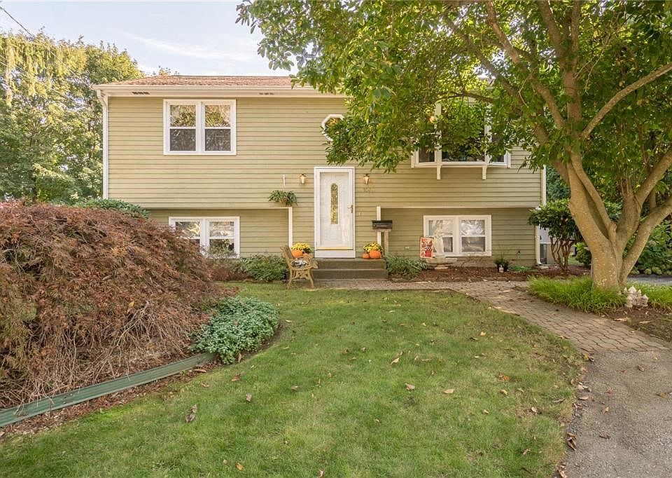 In Spring, the large magnolia tree is full of beautiful pink blooms!