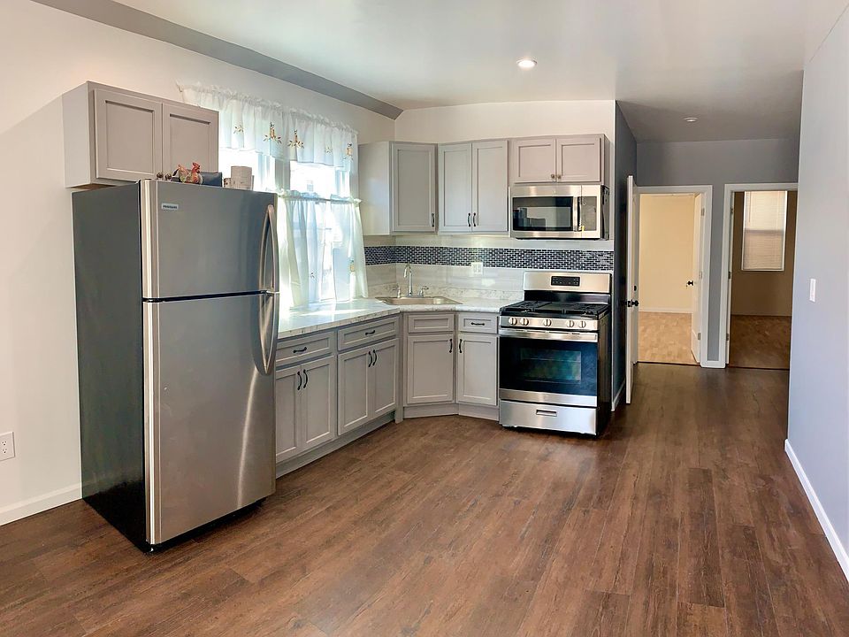 Open Kitchen with 2 large windows