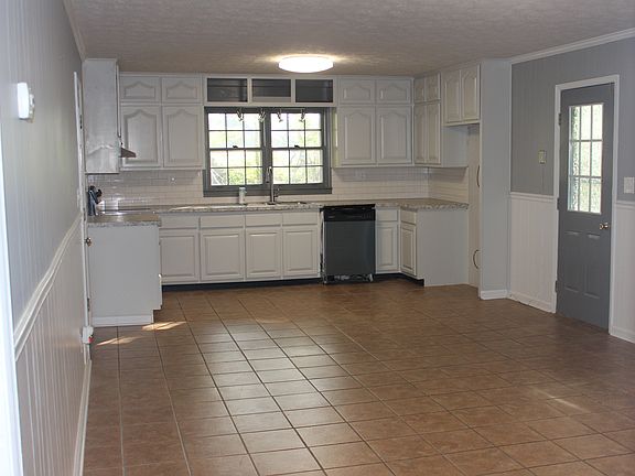 Kitchen opened to Keeping Room
