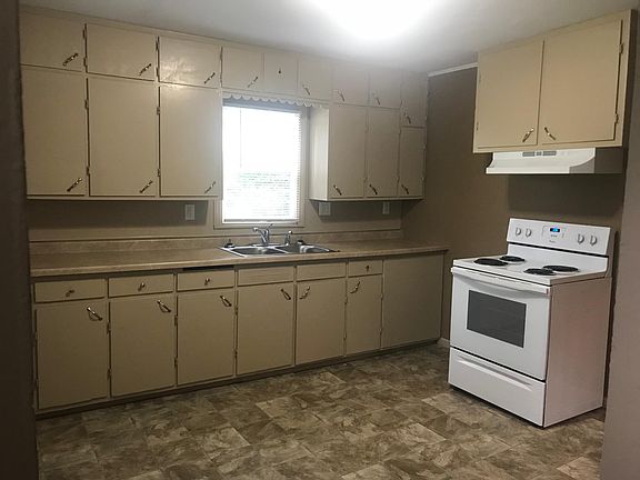 Kitchen, washer & dryer in lower level.