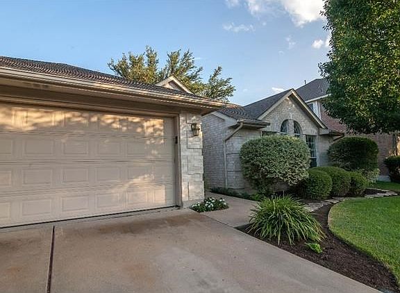Front of home with nice landscaping