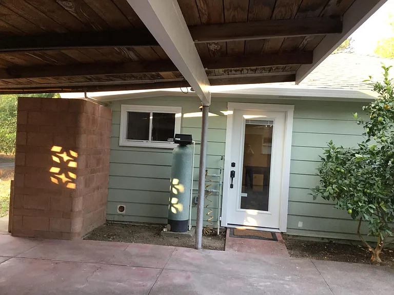 Kitchen entrance off carport