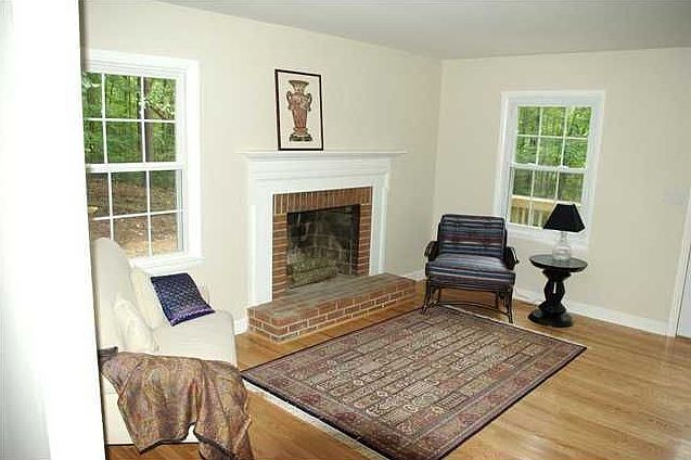 Charming Living Room w/ Fireplace