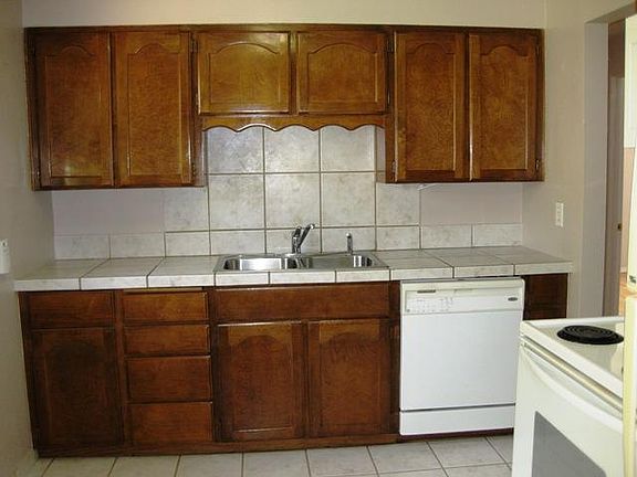 Kitchen. Stove, refer, microwave, dishwasher.
