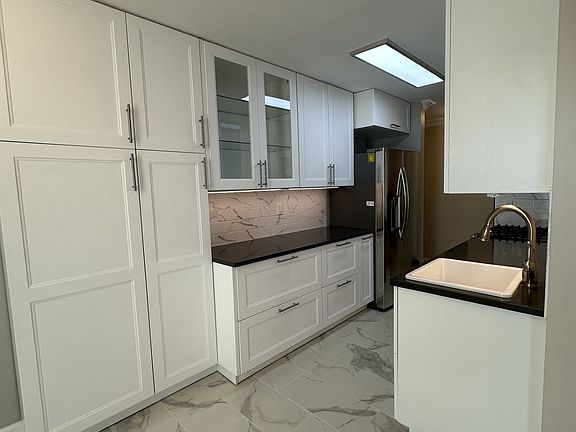 Kitchen you have cabinets galore here!