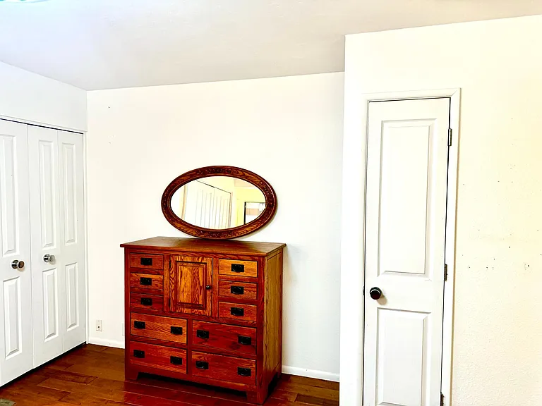 Large master is off the entrance way, and has four closets, a ceiling fan and new designer bath
